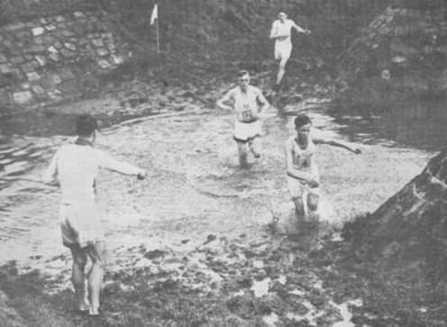 Runners wading through the watersplash at the 1946 Varsity Match