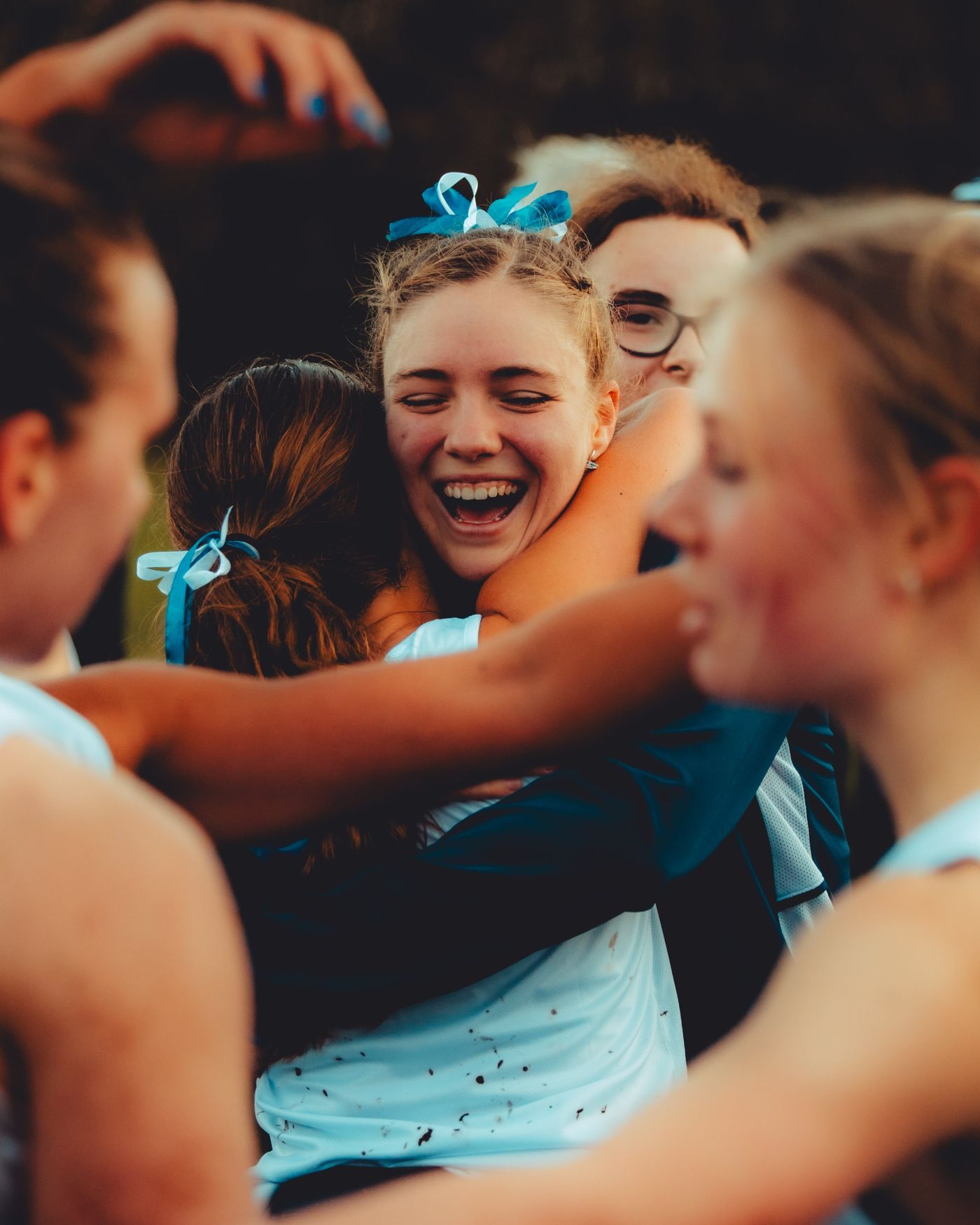 Oxford and Cambridge athletes embracing after the 2025 Ladies’ race