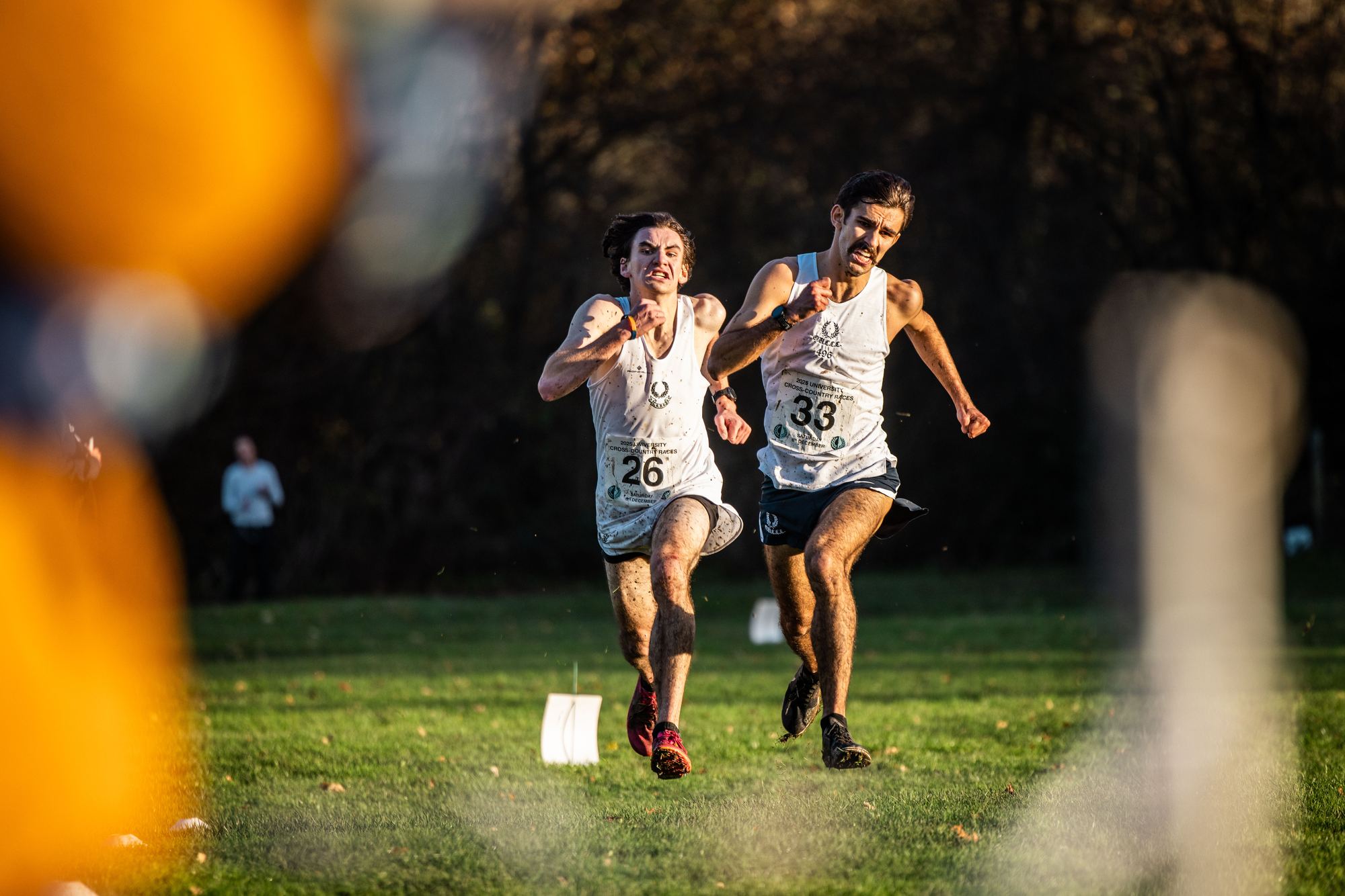 Two Gentlemen’s runners racing side by side towards the finish